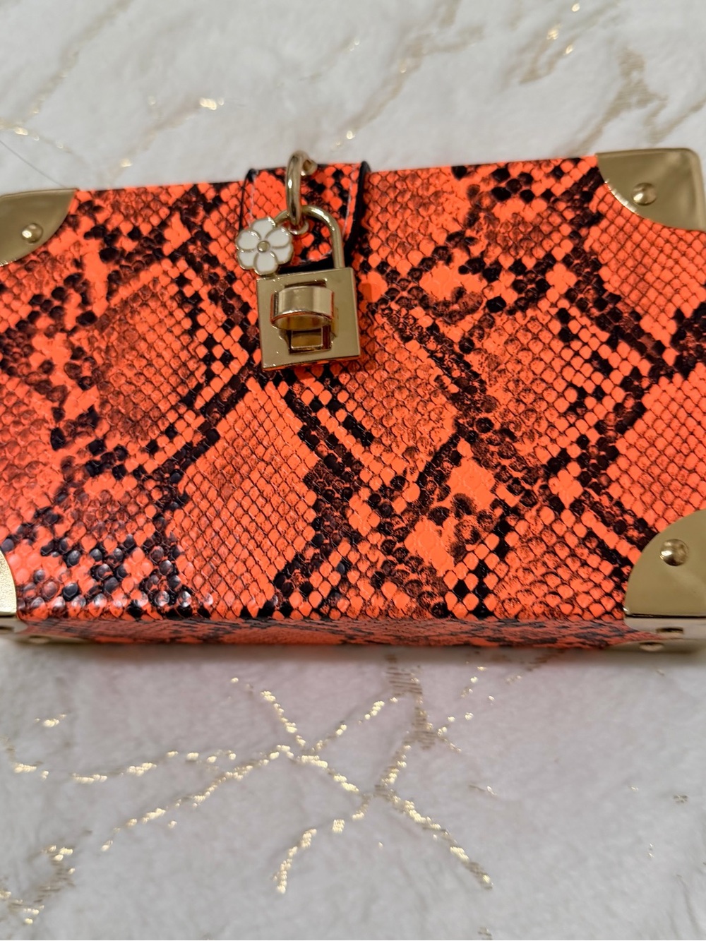 Vibrant Orange Snake-Print Clutch with Gold Accents
